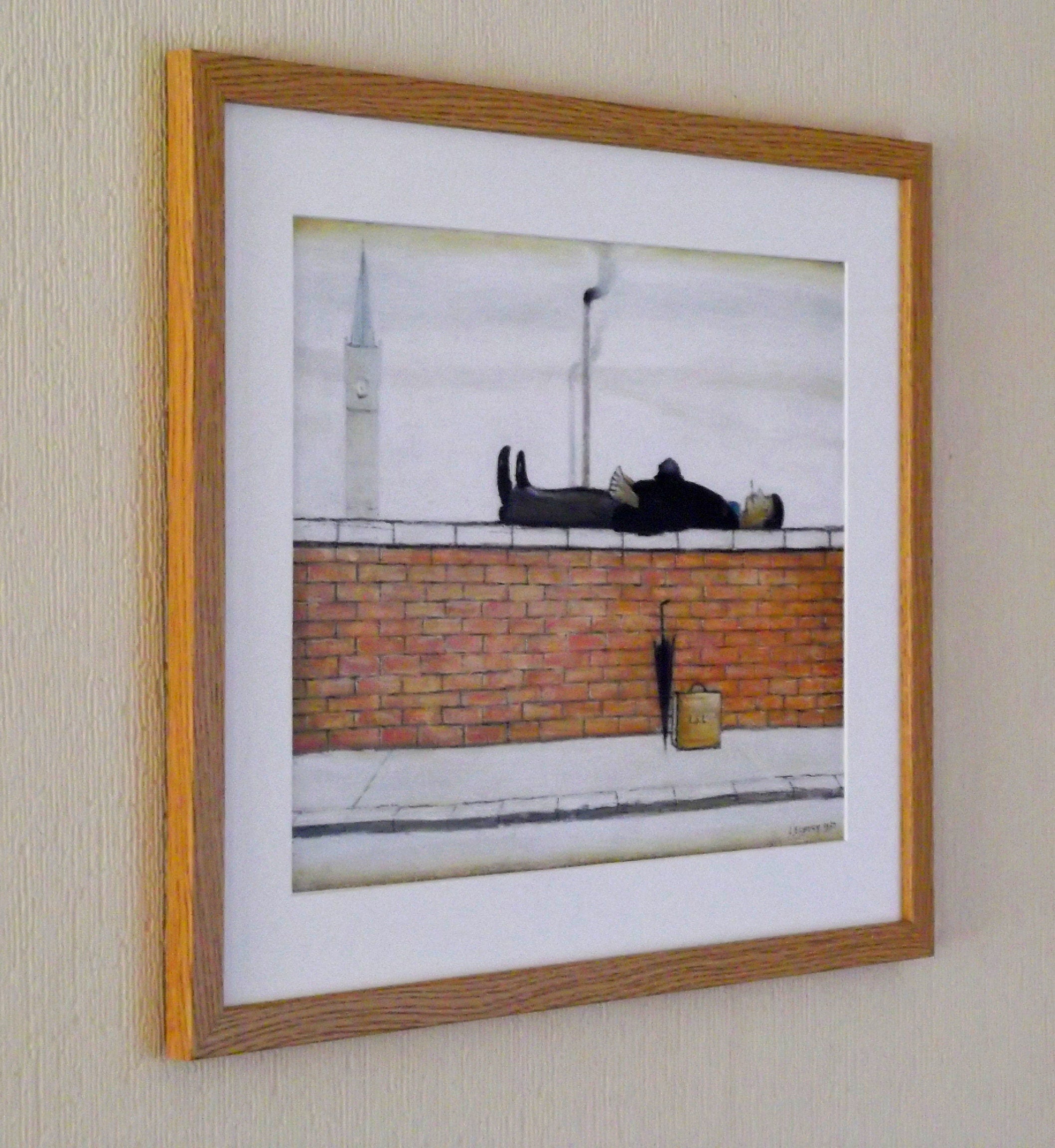 L S Lowry Print – Man Lying on Wall - Oak Finish Frame with Mount and Textured Image