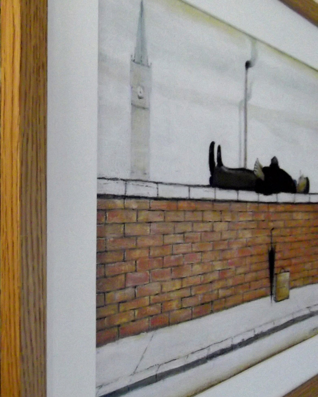 L S Lowry Print – Man Lying on Wall - Oak Finish Frame with Mount and Textured Image