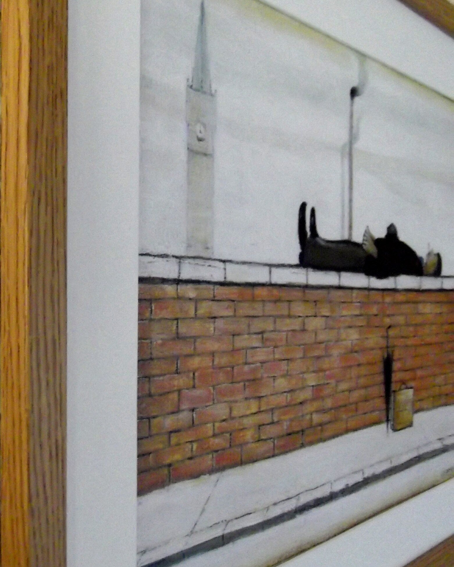 L S Lowry Print – Man Lying on Wall - Oak Finish Frame with Mount and Textured Image